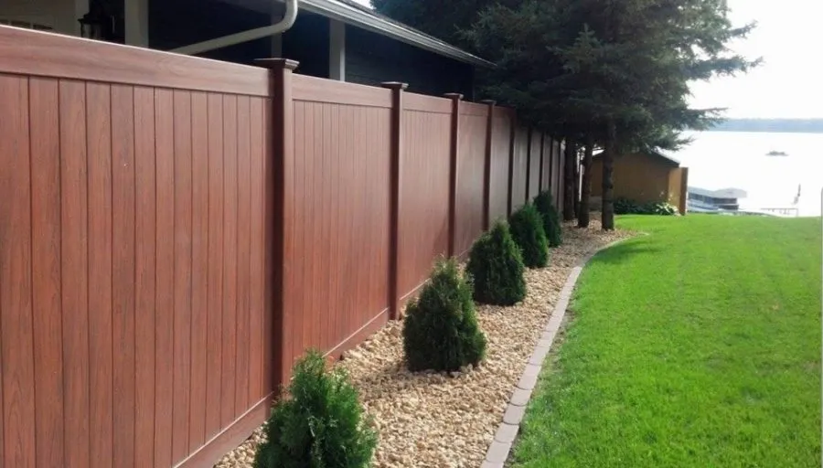 Timber fencing supported by ground screws instead of concrete