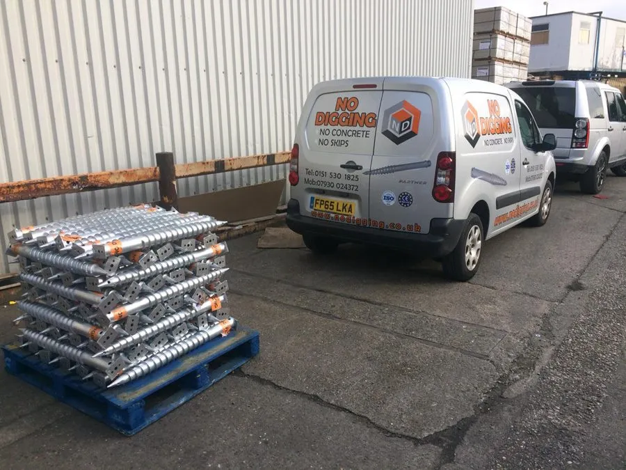 Pallets of galvanised ground screws ready for supply and delivery