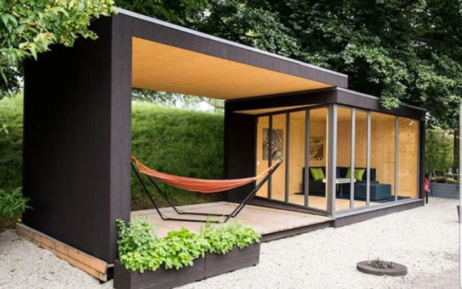 Garden room with wide glazing on ground screw foundations