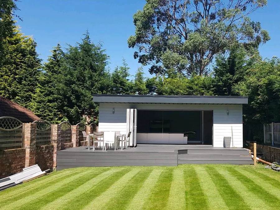 Garden building supported on ground screw foundations instead of concrete