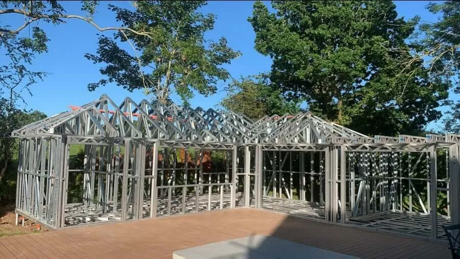 Galvanised steel garden building frame over a screw pile deck